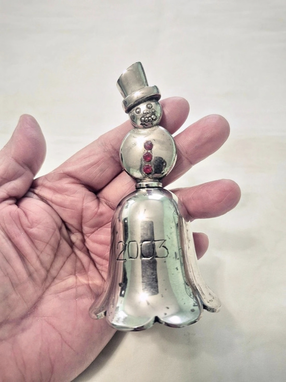 International Silver 2023 Snowman Bell in Silver & Red. 5